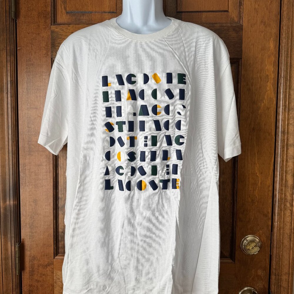 Lacoste White Short Sleeve Tee w/LACOSTE in Navy, White, Green & Yellow Letters